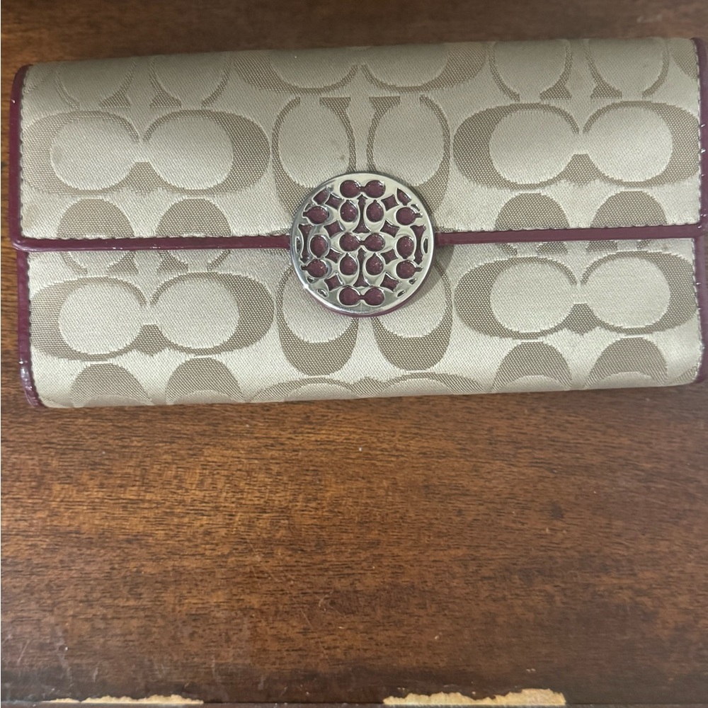 COACH  Bifold Wallet w/ Silver Coach Emblem and Elegant Maroon Leather Trim